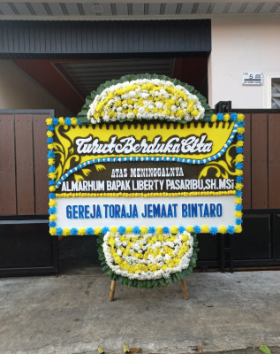 Papan Bunga Duka di Huwongo